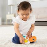 Imagen de Juego Dino Burbujas Popy Silicona Tomy Parque Jurásico 12m+ Naranja Y Blanco