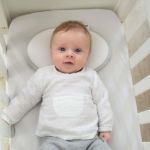 Imagen de Almohadilla Ergonomica Para Bebes Evita Cabeza Plana Doomoo Blanco