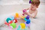 Imagen de Juguete Para Baño Delfines Acuáticos Musicales Tomy Niños 