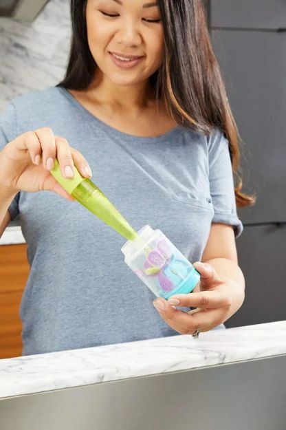 Imagen de Cepillo Limpiamema Boon Silicona Con Dispensador De Jabon Verde