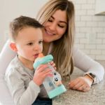 Imagen de Botella Con Sorbito Silicona Y Huesito Flotante Bebes 24m+ Blanco Perrito