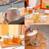 Imagen de Taza de vidrio con asa y cuchara tapa con oso