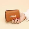 Imagen de Billetera con bolsillo frontal Ushas