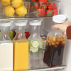 Imagen de Botella cuadrada transparente con tapa dispensadora 1,5lts