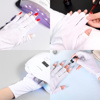Imagen de Guantes con protección para uso de lámparas de uñas UV Gel