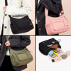 Imagen de Bolso Ushas de mano con correa ajustable y bolsillos exteriores