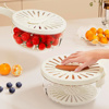 Imagen de Recipiente escurridor de vegetales y frutas  con asa plegable