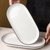 Imagen de Fuente ceramica borde negro - 35,5cm.