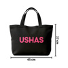 Imagen de Bolso Ushas en tela con asas para colgar.