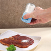 Imagen de Salero de vidrio tapa color con boton dispensador