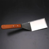 Imagen de Espatula metal para cocina mango madera