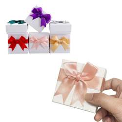 Imagen de Caja de regalo con moña - Fuerte y elegante - Alhajas Medallas Relagos empresariales